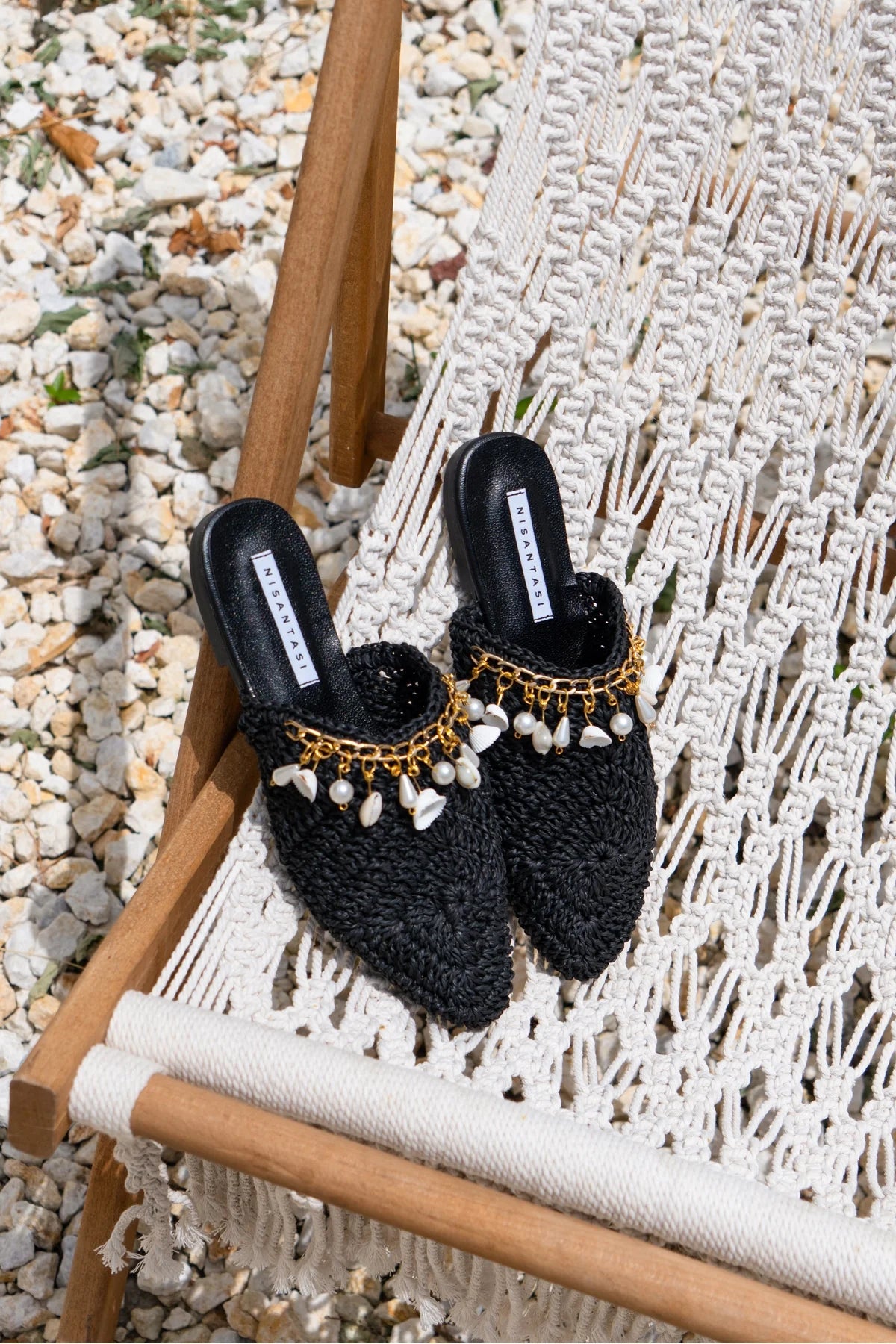 Black Woven Mules with Seashell Detail
