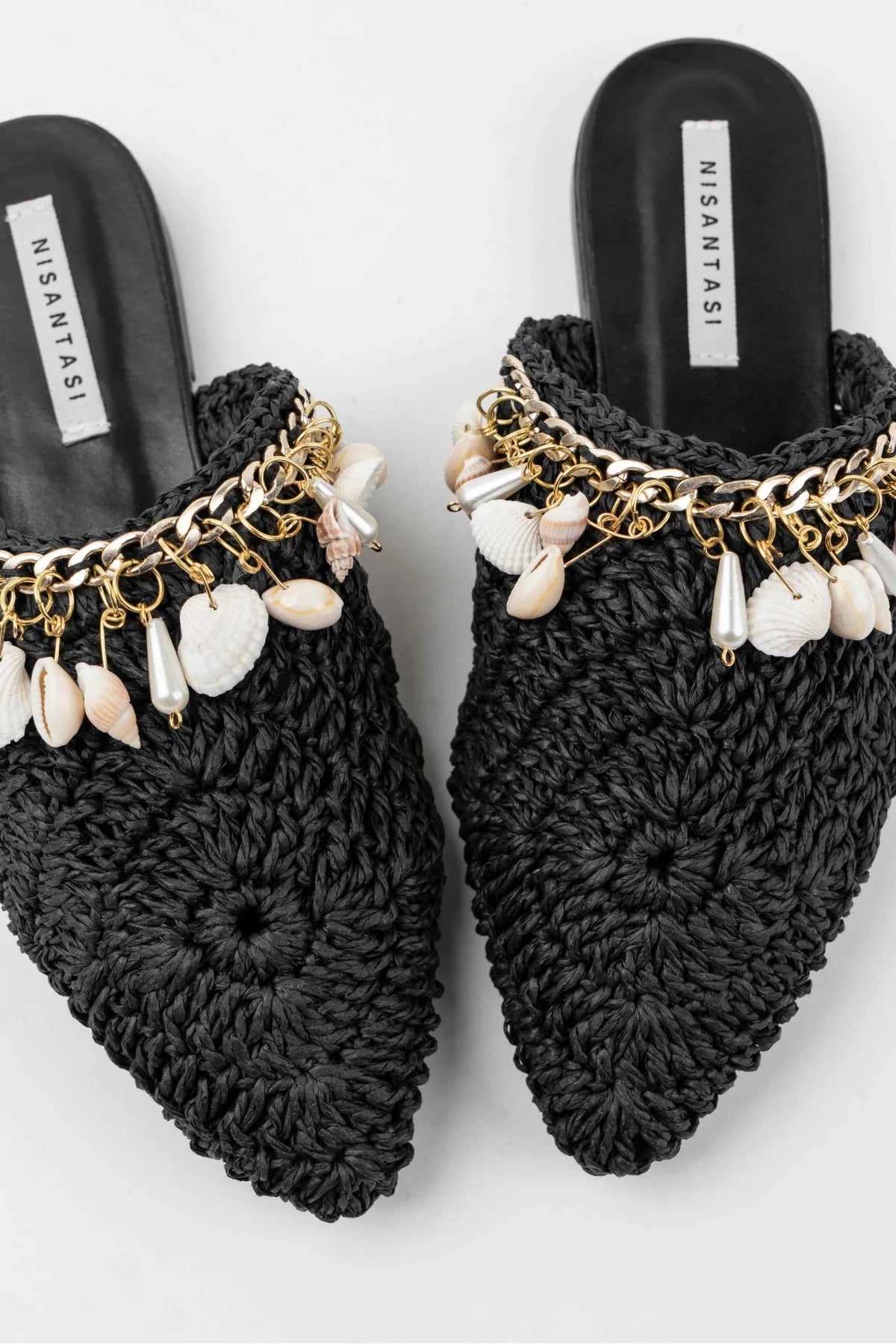 Black Woven Mules with Seashell Detail